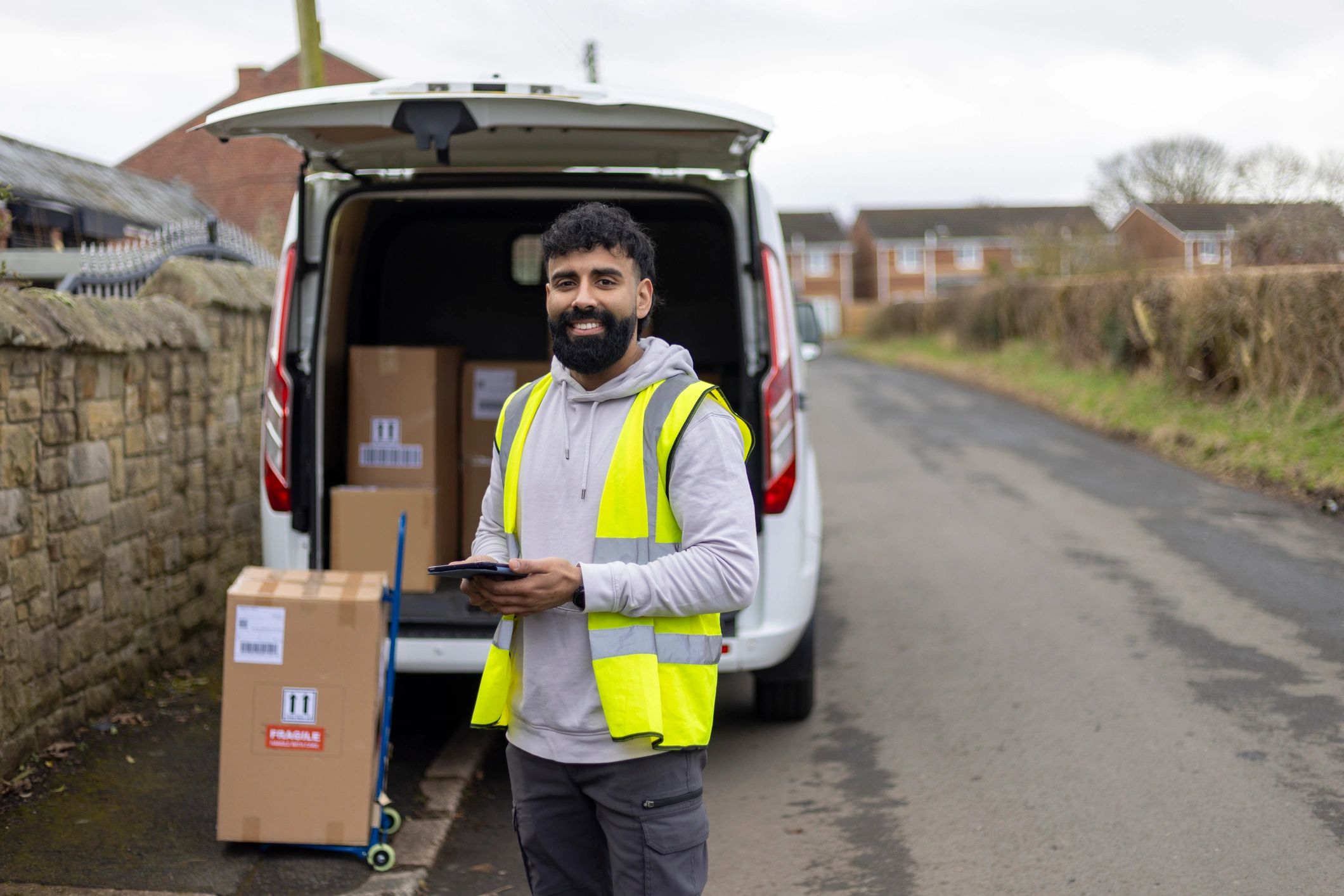 Delivery driver with van and tablet