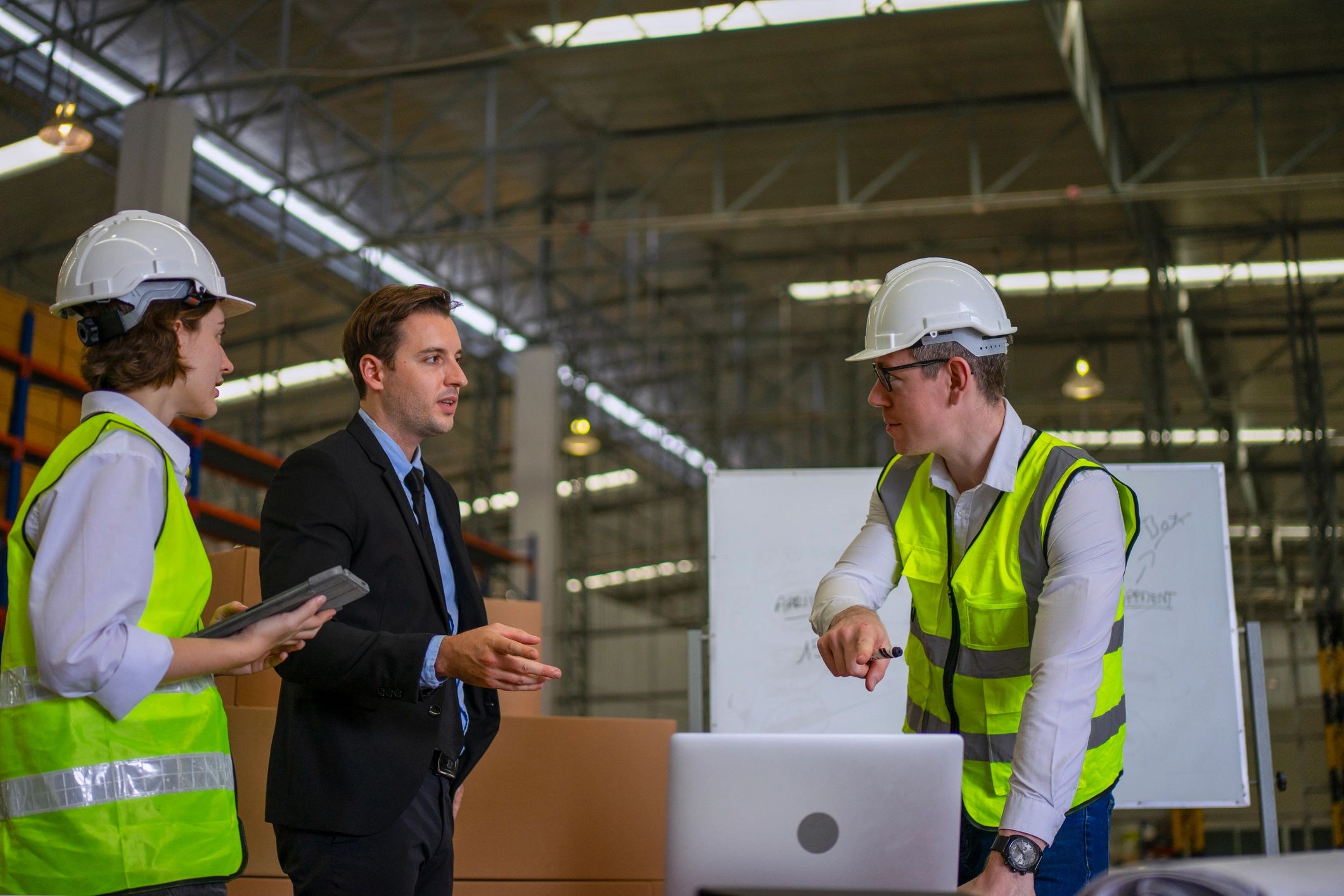 Warehouse team meeting during logistics operations