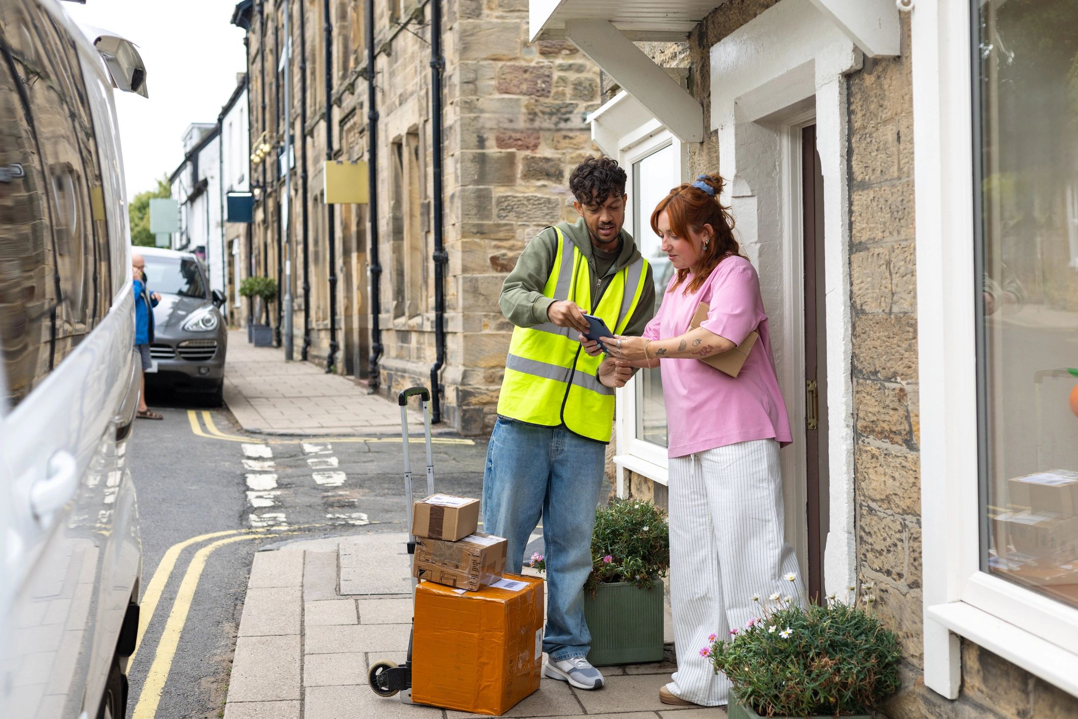 Delivery driver completing a shipment handoff